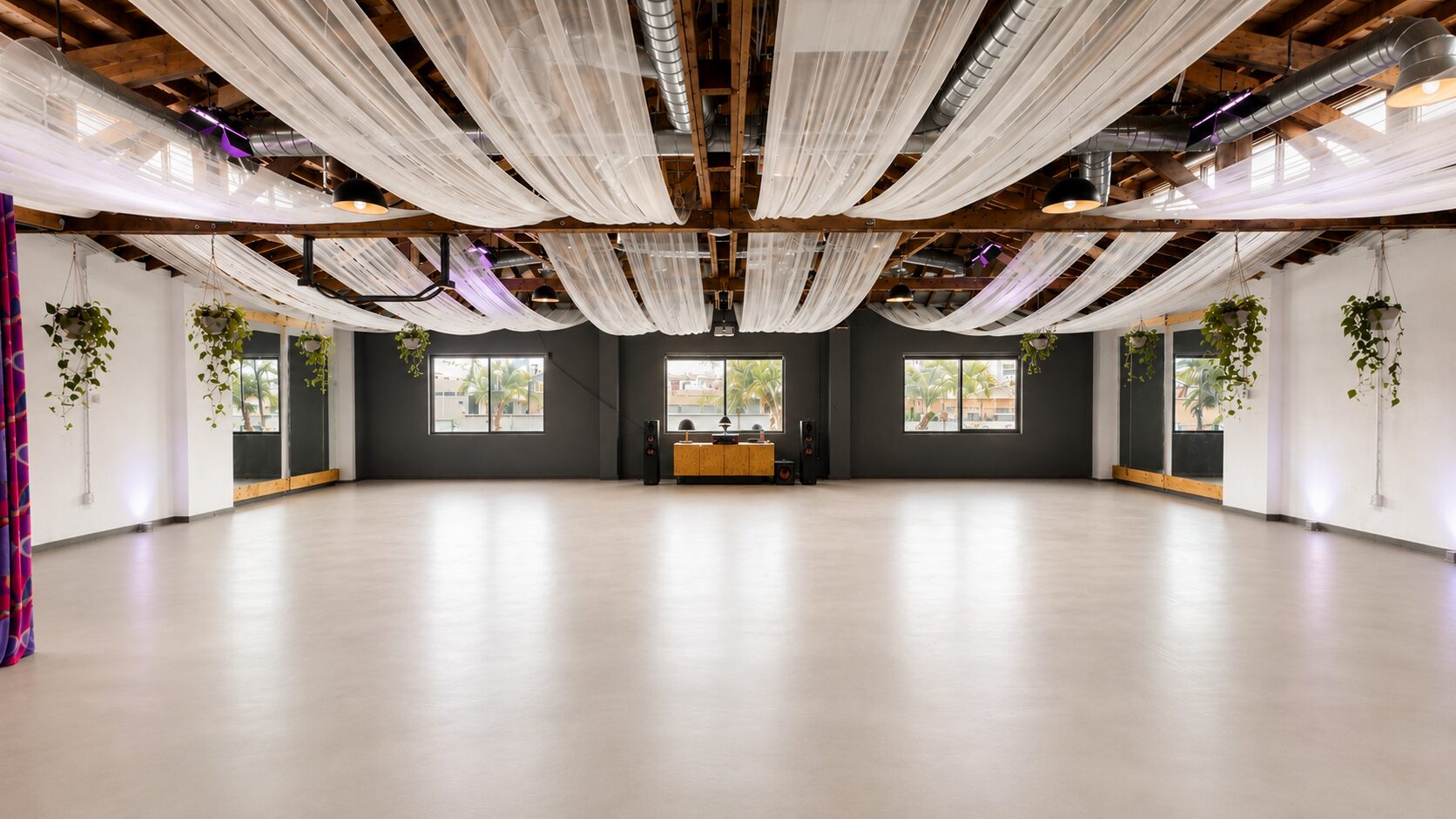 The open third floor, with draped ceilings and exposed wood beams